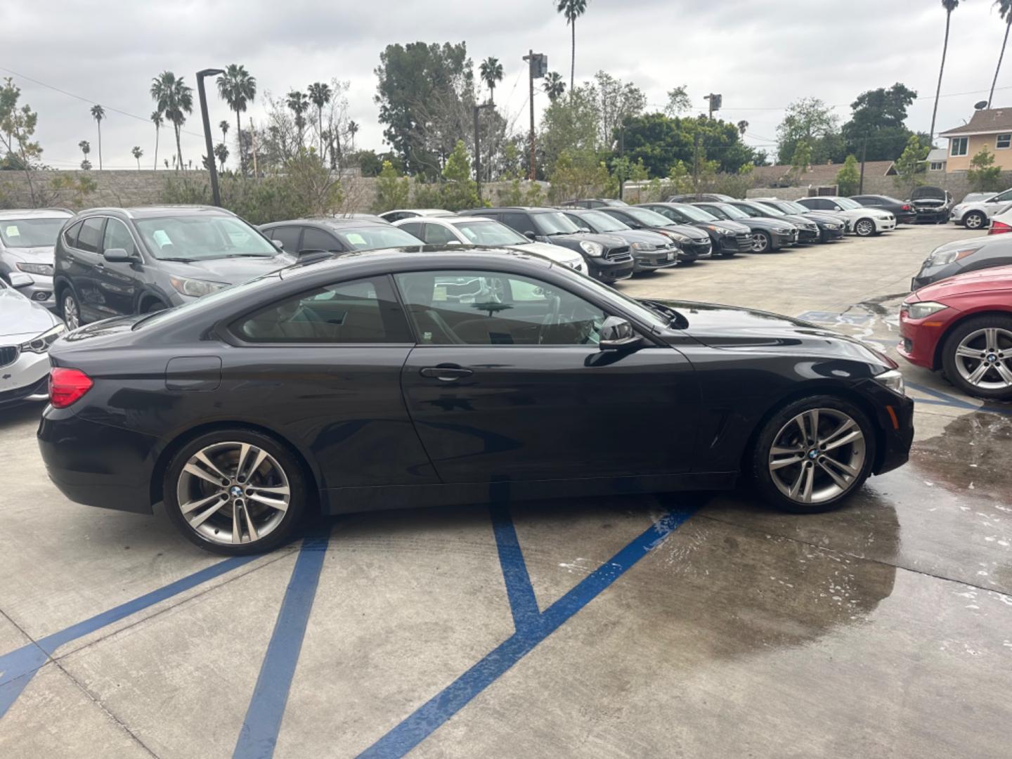 2015 Black BMW 4-Series 435i coupe (WBA3R1C55FK) with an 3.0L V6 DOHC 24V engine, 8-Speed Automatic transmission, located at 30 S. Berkeley Avenue, Pasadena, CA, 91107, (626) 248-7567, 34.145447, -118.109398 - Crown City Motors is a used “Buy Here Pay Here” car dealer in Pasadena CA. “Buy Here Pay Here” financing, means that when you purchase your vehicle from our dealership, that you make the payments to the dealership as well. We do not need the banks approval to get you approved for a used auto - Photo#5